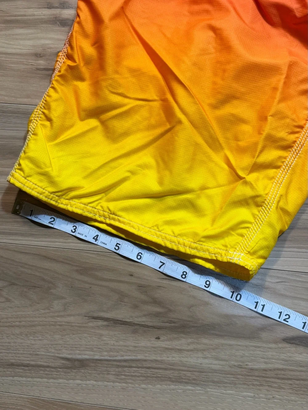 Brand new with tags Rusty Men’s Gradient Red-Orange-Yellow Swim Trunks